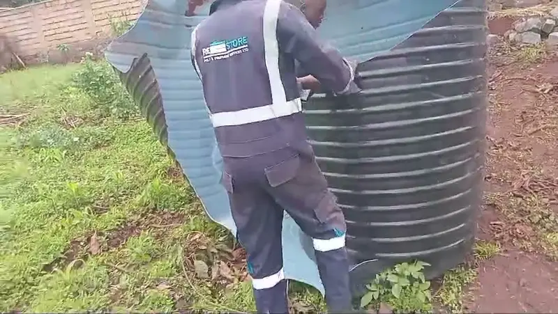 Positioning a tank with a crane