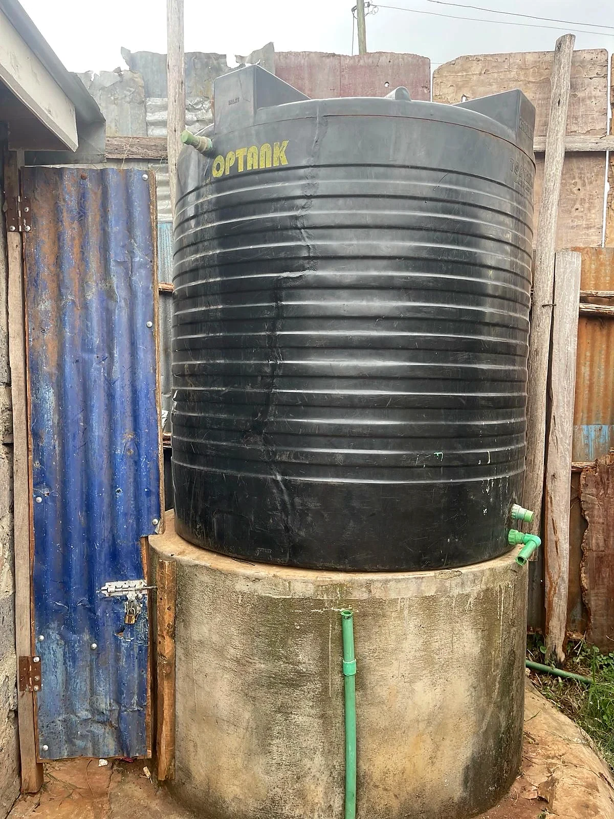 Repaired water tank on a concrete base