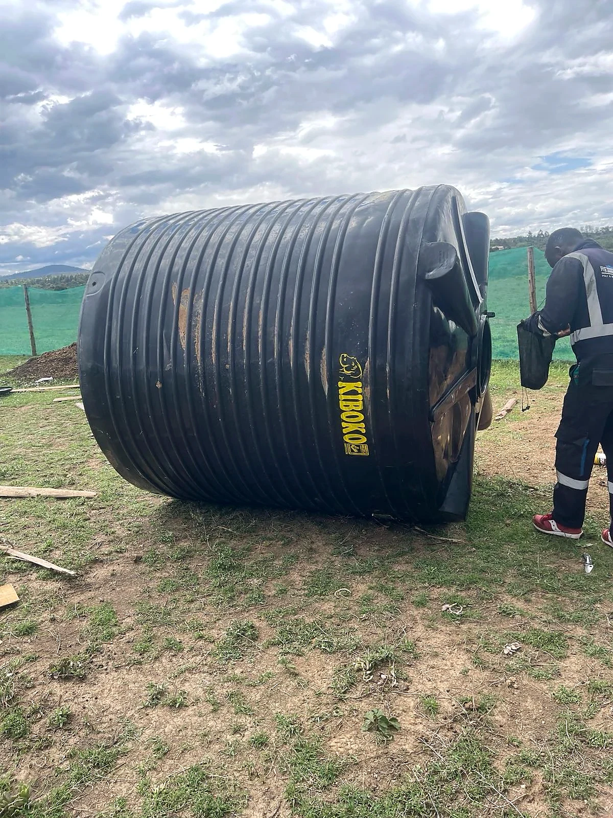 Damaged tank side before repair