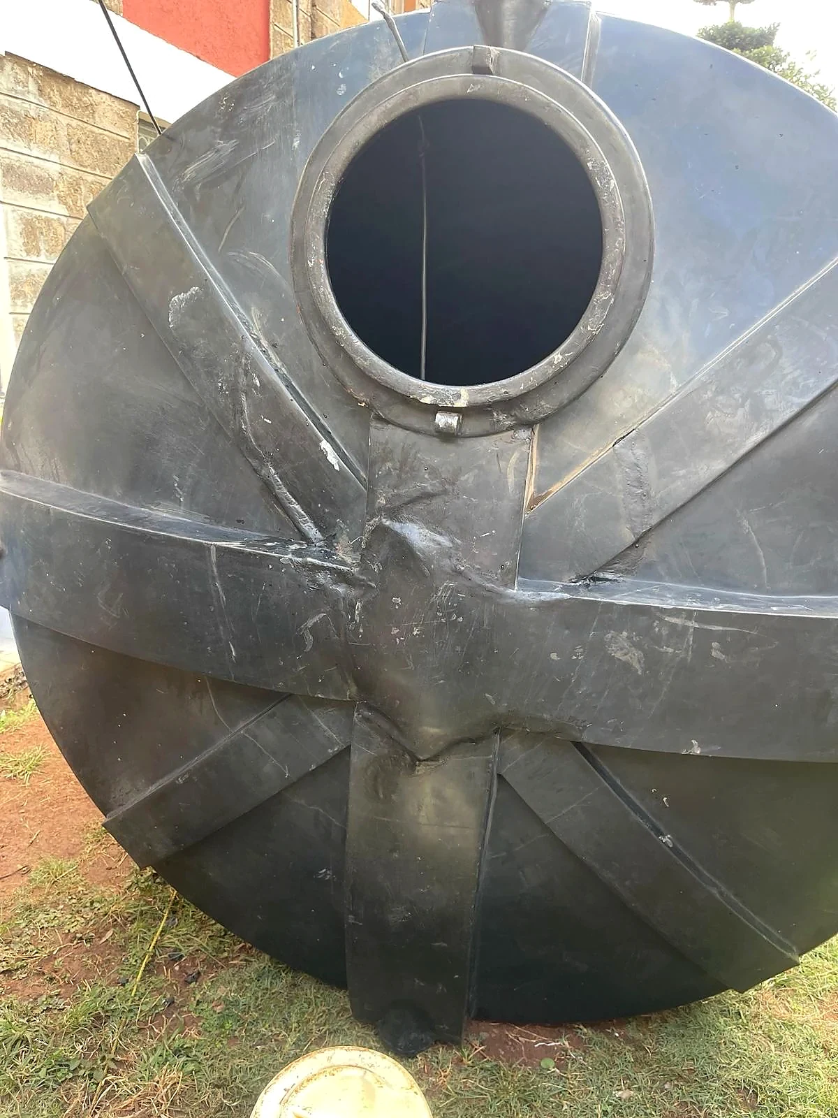 Finished base detail of a repaired water tank